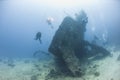 Diver exploring a large shipwreck Royalty Free Stock Photo