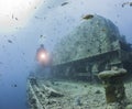 Diver exploring a large shipwreck Royalty Free Stock Photo