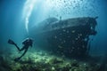 Diver in front of the sunken hull. Royalty Free Stock Photo