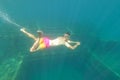 Diver looking at shipwreck under water, very old ship taken on the bottom of the sea, Zavratnica Croatia Royalty Free Stock Photo