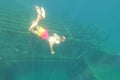 Diver looking at shipwreck under water, very old ship taken on the bottom of the sea, Zavratnica Croatia Royalty Free Stock Photo