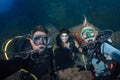 Diver making a selfie on corals reef background Royalty Free Stock Photo