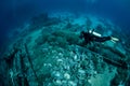 Diver over Underwater wreckage Royalty Free Stock Photo