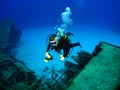 Diver photographing a Sunken Shipwreck