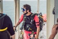 Diver preparing to dive into the sea