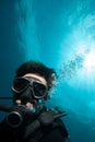 Diver scuba diving bunaken indonesia sea reef ocean close up Royalty Free Stock Photo