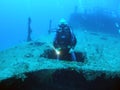 Diver in shipwreck