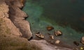 Diver with a spoon in a cove