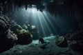 a diver, surrounded by the unique and alien world of an underwater cave system Royalty Free Stock Photo