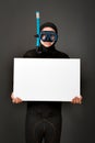 Diver with white billboard Royalty Free Stock Photo