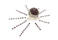 A divergent conceptual graphic of a small bag of coffee beans and a large number of individual coffee beans on a white background Royalty Free Stock Photo