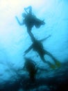 Divers ascending