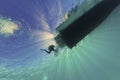 Divers doing a safety stop under the dive boat