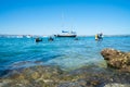 Divers entering water at Pilot Bay wharf for annual beach clean