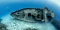 Divers examining the famous USS Kittiwake submarine wreck in the Grand Cayman Islands Royalty Free Stock Photo