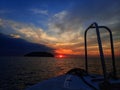 Getting ready for a sunset and night dive adventure onboard. Royalty Free Stock Photo