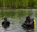 Divers look at the watch Royalty Free Stock Photo