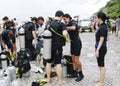 Divers preparing to dive, Koh Nanguan, Thailand. Royalty Free Stock Photo