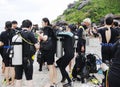 Divers preparing to dive, Koh Nanguan, Thailand. Royalty Free Stock Photo
