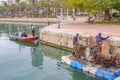 Divers removing dumped scrap and rubbish from alicante harbour