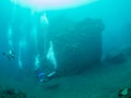 Divers at a ship wreck Royalty Free Stock Photo