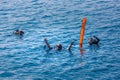 01.08.2017, Ari atoll - Maldives: Scuba divers with sign before diving. Tropical sea activity, underwater