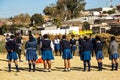 Diverse African high school pupils playing physical games on the sports field Royalty Free Stock Photo
