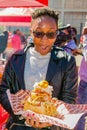 Diverse African people at a bread based street food outdoor festival