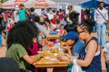 Diverse African people at a bread based street food outdoor festival