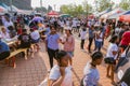 Diverse African people at a bread based street food outdoor festival