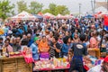 Diverse African people at a bread based street food outdoor festival