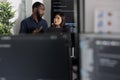 Diverse app programmers looking at algorithms artificial intelligence Royalty Free Stock Photo