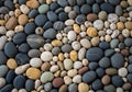 A diverse array of smooth pebbles arranged closely together, Royalty Free Stock Photo