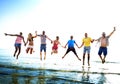 Diverse Beach Summer Friends Fun Jump Shot Concept Royalty Free Stock Photo