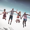 Diverse Beach Summer Friends Fun Jump Shot Concept Royalty Free Stock Photo