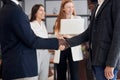 Diverse business male shaking hands in office Royalty Free Stock Photo