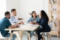 Diverse business partners discussing project strategy at meeting Royalty Free Stock Photo