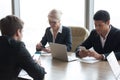 Diverse business people executives holding phones using smartphones