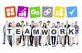 Diverse Business People Holding Word Teamwork Royalty Free Stock Photo