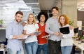 Diverse business people standing together and smiling. Royalty Free Stock Photo