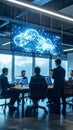 Diverse business professionals in a modern conference room discussing cloud computing data on a large screen Royalty Free Stock Photo