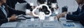 Business team collaborating in a modern office with cloud technology icons and analytics data displayed on a table Royalty Free Stock Photo