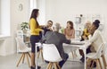 Multiracial team of business people having a work meeting around the office table Royalty Free Stock Photo