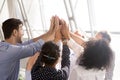 Diverse business team office workers group giving high five toge