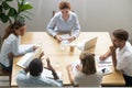 Diverse business team listening to leader at meeting, top view Royalty Free Stock Photo