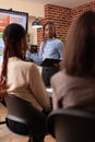 Diverse businesspeople analyzing marketing graph on monitor Royalty Free Stock Photo