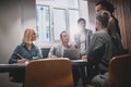 Diverse businesspeople working together during a boardroom meeti Royalty Free Stock Photo