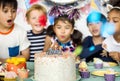 Diverse children celebrating birthday party