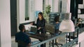Diverse coders talking about source code on terminal window