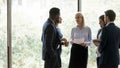 Diverse colleagues brainstorm discussing business ideas together Royalty Free Stock Photo